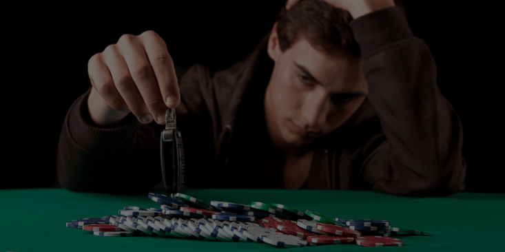 man with poker chips