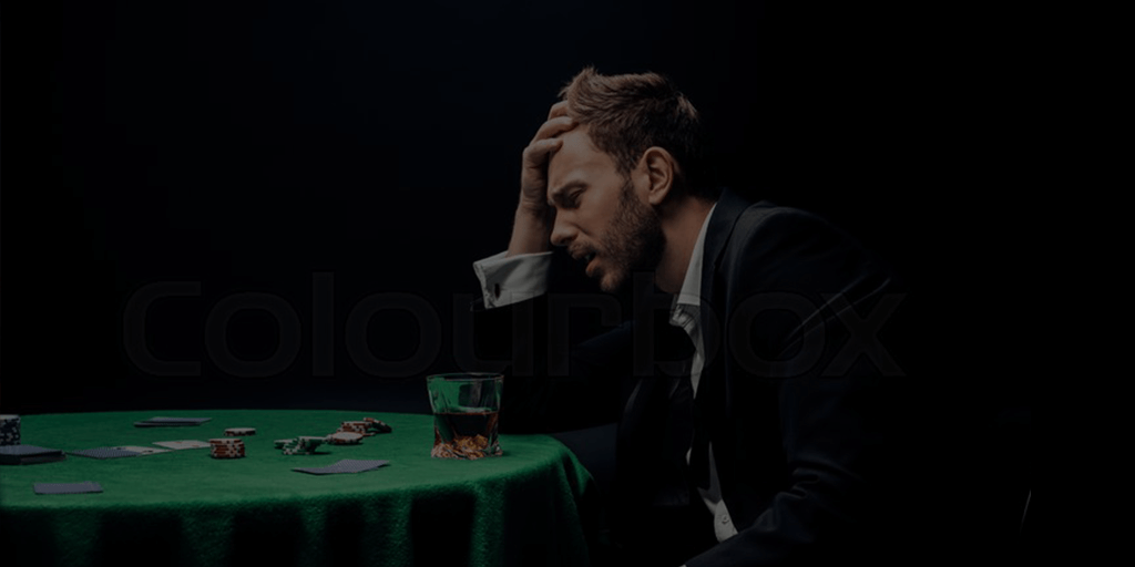 man losing at poker table